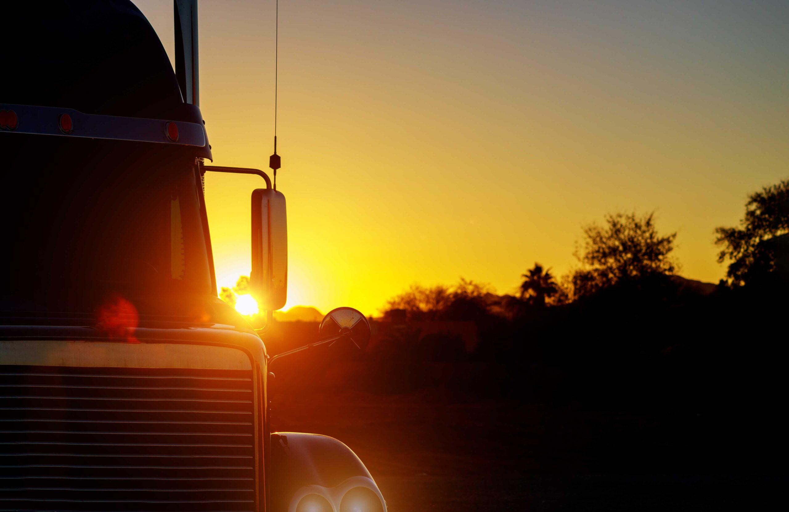 close up shot the front of a truck against sunset 2022 11 12 10 41 21 utc_optimized scaled